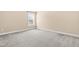 Bedroom with neutral walls and plush carpeting and a single window at 347 Country Mill Way, Fuquay Varina, NC 27526