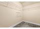 Carpeted walk-in closet featuring wire shelving at 347 Country Mill Way, Fuquay Varina, NC 27526