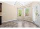 Bright dining area with tile flooring and views of the backyard at 347 Country Mill Way, Fuquay Varina, NC 27526