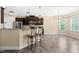 Kitchen featuring bar seating and stainless steel appliances at 347 Country Mill Way, Fuquay Varina, NC 27526
