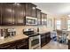 Well-equipped kitchen with granite countertops and stainless steel appliances at 347 Country Mill Way, Fuquay Varina, NC 27526