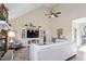 Open living room showcasing vaulted ceilings, built-in storage, and comfortable seating at 347 Country Mill Way, Fuquay Varina, NC 27526