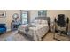 Comfortable main bedroom featuring a bed, bedside tables, and decorative accessories at 347 Country Mill Way, Fuquay Varina, NC 27526
