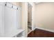 Mud room area with coat hooks and storage bench near the entrance and closet at 347 Country Mill Way, Fuquay Varina, NC 27526