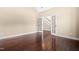 Spacious office features hardwood floors, glass French doors, and neutral walls at 347 Country Mill Way, Fuquay Varina, NC 27526