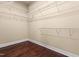 Walk-in closet with wood floors and installed white wire shelving at 347 Country Mill Way, Fuquay Varina, NC 27526