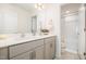 Bathroom boasts dual vanity sinks and a separate tub and shower at 370 Hickory Run Ln, Franklinton, NC 27525