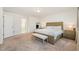 Bright bedroom with queen-size bed and neutral decor at 370 Hickory Run Ln, Franklinton, NC 27525