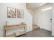 Light and airy entryway with a console table and access to the staircase at 370 Hickory Run Ln, Franklinton, NC 27525