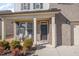 Inviting front porch with seating and well-maintained landscaping at 370 Hickory Run Ln, Franklinton, NC 27525