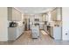 Modern kitchen with gray cabinets, granite countertops, and stainless steel appliances at 370 Hickory Run Ln, Franklinton, NC 27525