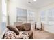 Cozy sitting area with comfortable chair and large windows at 370 Hickory Run Ln, Franklinton, NC 27525