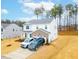 Two-story house with driveway, landscaping, and nearby homes visible at 53 Albereto Dr, Clayton, NC 27527