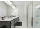 Modern bathroom with double vanity, large shower, and ample storage at 53 Albereto Dr, Clayton, NC 27527