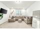 Bonus room with sectional sofa and large TV at 53 Albereto Dr, Clayton, NC 27527