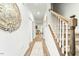 Elegant entryway with hardwood floors and staircase at 53 Albereto Dr, Clayton, NC 27527