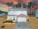 Two-story home with brick and vinyl siding at 53 Albereto Dr, Clayton, NC 27527
