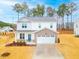 Two-story home with brick and vinyl siding at 53 Albereto Dr, Clayton, NC 27527