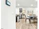 Modern kitchen with dark cabinetry, granite island, and stainless steel appliances at 53 Albereto Dr, Clayton, NC 27527