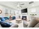Spacious living room with fireplace and comfortable seating at 53 Albereto Dr, Clayton, NC 27527