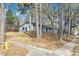 Newly remodeled home with a large front yard at 5808 Farm Gate Rd, Raleigh, NC 27606