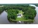 Waterfront property featuring a large home and private dock at 5891 Baker Ln, Rocky Mount, NC 27803