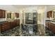 Large bathroom with and sinks, a large shower, and marble floors at 5891 Baker Ln, Rocky Mount, NC 27803