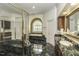 Luxurious bathroom with soaking tub, walk-in shower, and marble flooring at 5891 Baker Ln, Rocky Mount, NC 27803