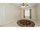 Bright bedroom with ceiling fan, window, and carpet at 5891 Baker Ln, Rocky Mount, NC 27803