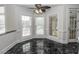 Breakfast nook with bay window and dark marble floor at 5891 Baker Ln, Rocky Mount, NC 27803