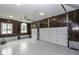 Large garage with double doors and wooden walls at 5891 Baker Ln, Rocky Mount, NC 27803