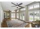 Bright sunroom with hardwood floors and lake views at 5891 Baker Ln, Rocky Mount, NC 27803