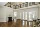 Elegant living area with hardwood floors and high ceilings at 5891 Baker Ln, Rocky Mount, NC 27803