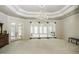 Spacious main bedroom with sitting area and access to a private patio at 5891 Baker Ln, Rocky Mount, NC 27803