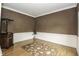 Spacious office with hardwood floors and built-in cabinetry at 5891 Baker Ln, Rocky Mount, NC 27803