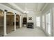 Bright sitting room with fireplace and built-in shelving at 5891 Baker Ln, Rocky Mount, NC 27803