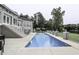 Inviting rectangular swimming pool with a large patio area at 5891 Baker Ln, Rocky Mount, NC 27803