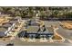 Aerial view of townhome community showcasing multiple units and surrounding landscape at 608 Marshskip Way, Rolesville, NC 27587