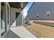 Backyard area with a door to the house at 608 Marshskip Way, Rolesville, NC 27587