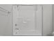 Modern bathtub with white surround, offering a relaxing and clean bathing space at 608 Marshskip Way, Rolesville, NC 27587