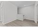 An open bedroom with natural light and nice hardwood flooring at 608 Marshskip Way, Rolesville, NC 27587