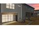 Modern townhome with a private entrance and attached garage, offering convenient and stylish living at 608 Marshskip Way, Rolesville, NC 27587
