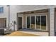 This patio has a sliding glass door and a door to the house at 608 Marshskip Way, Rolesville, NC 27587