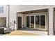 Back patio with sliding doors, showcasing seamless indoor-outdoor living, perfect for relaxing or entertaining at 610 Marshskip Way, Rolesville, NC 27587