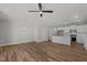 Open concept dining room with hardwood floors and kitchen view at 610 Marshskip Way, Rolesville, NC 27587