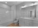 Bathroom with double vanity, tub, and shower at 612 Marshskip Way, Rolesville, NC 27587
