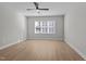 Spacious bedroom featuring wood-look floors and a window at 612 Marshskip Way, Rolesville, NC 27587