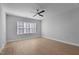 Bright bedroom with wood-look floors and a large window at 612 Marshskip Way, Rolesville, NC 27587