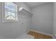 Laundry room with built-in shelving and vinyl flooring at 612 Marshskip Way, Rolesville, NC 27587