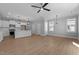 Open concept living area with hardwood floors and kitchen views at 612 Marshskip Way, Rolesville, NC 27587